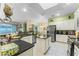 Large kitchen with island, stainless steel appliances, and granite counters at 8038 Glitter Ct, Orlando, FL 32836