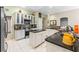 Modern kitchen with white cabinets, granite counters, and island at 8038 Glitter Ct, Orlando, FL 32836