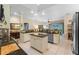 Kitchen with island, granite countertops, and stainless steel appliances at 8038 Glitter Ct, Orlando, FL 32836