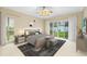 Spacious main bedroom with backyard access and modern decor at 8038 Glitter Ct, Orlando, FL 32836