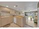 Fully equipped kitchen with light wood cabinets and tile floors at 4831 Saxon Dr # 2270, New Smyrna Beach, FL 32169