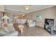Open concept living room, dining, and kitchen area at 4831 Saxon Dr # 2270, New Smyrna Beach, FL 32169