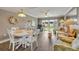 Spacious living room with sliding doors to balcony and ocean view at 4831 Saxon Dr # 2270, New Smyrna Beach, FL 32169