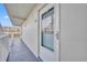 Inviting hallway with access to condo unit at 4831 Saxon Dr # 2270, New Smyrna Beach, FL 32169