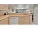 Modern kitchen with a breakfast bar overlooking the living room at 4831 Saxon Dr # 2270, New Smyrna Beach, FL 32169