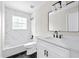 Updated bathroom with marble shower and hexagon tile floor at 12200 Treetop Ct, Orlando, FL 32832