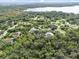 Aerial view of houses near a lake at 12200 Treetop Ct, Orlando, FL 32832