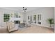 Spacious living room with fireplace, hardwood floors, and access to backyard at 12200 Treetop Ct, Orlando, FL 32832