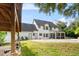 Two-story house with a pool and a large backyard at 12200 Treetop Ct, Orlando, FL 32832
