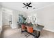 Dining room with large wooden table and modern lighting at 12200 Treetop Ct, Orlando, FL 32832