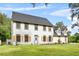 Two story house with shutters and lawn at 12200 Treetop Ct, Orlando, FL 32832