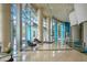 Modern building lobby with seating area and large windows at 322 E Central Blvd # 1214, Orlando, FL 32801