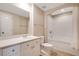 Bathroom features a bathtub, toilet and vanity with mirror at 322 E Central Blvd # 1214, Orlando, FL 32801