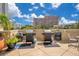Outdoor grilling station with two grills and waste receptacles at 322 E Central Blvd # 1214, Orlando, FL 32801