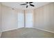 Spacious bedroom with two closets and ceiling fan at 322 E Central Blvd # 1214, Orlando, FL 32801