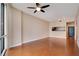 Living room with hardwood floors and kitchen passthrough at 322 E Central Blvd # 1214, Orlando, FL 32801