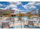 Expansive pool area with tables and chairs for dining at 322 E Central Blvd # 1214, Orlando, FL 32801