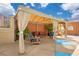 Covered seating area with comfortable chairs and a couch at 322 E Central Blvd # 1214, Orlando, FL 32801