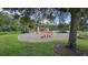 playground with swings and climbing structures at 10759 Gran Paradiso Dr # S, Orlando, FL 32832