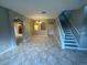 Open dining area with tile floors and staircase access at 3643 Daydream Pl, Saint Cloud, FL 34772