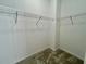 Spacious walk-in closet with wire shelving at 1431 Pacific Rd, Poinciana, FL 34759