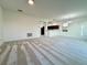 Open dining room with a view of the kitchen at 1431 Pacific Rd, Poinciana, FL 34759