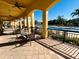 Covered patio area overlooking the community pool at 1431 Pacific Rd, Poinciana, FL 34759
