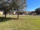 Community green space with several townhomes visible at 1431 Pacific Rd, Poinciana, FL 34759