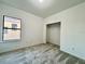 Charming bedroom with window and walk-in closet at 1431 Pacific Rd, Poinciana, FL 34759