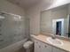Clean bathroom with a single sink and shower/tub at 11434 Jasper Kay Ter # 306, Windermere, FL 34786