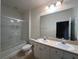 Bathroom boasts double sinks and a shower/tub combo at 11434 Jasper Kay Ter # 306, Windermere, FL 34786