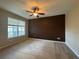 Spacious bedroom with large window and neutral wall colors at 11434 Jasper Kay Ter # 306, Windermere, FL 34786
