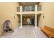 Building entryway with fountain, elevator, and seating at 11434 Jasper Kay Ter # 306, Windermere, FL 34786