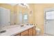 Bathroom with single sink, toilet and shower at 5203 Jasmine Trace Ln, Kissimmee, FL 34758