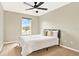 Cozy bedroom with a queen-size bed and ample natural light at 2685 Star Grass Cir, Kissimmee, FL 34746