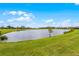 Stunning lakefront view with lush greenery at 2717 Greenlands St, St Cloud, FL 34772