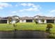 Community of lakefront homes with solar panels at 2717 Greenlands St, St Cloud, FL 34772