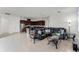 Spacious living room with sectional sofa and kitchen access at 2717 Greenlands St, St Cloud, FL 34772