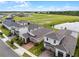 Aerial view of homes near a lake, showcasing community landscape at 2717 Greenlands St, St Cloud, FL 34772