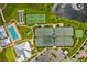 Community tennis and pickleball courts near a pool at 2717 Greenlands St, St Cloud, FL 34772