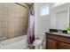 Bathroom with shower/tub combo and granite vanity at 2717 Greenlands St, St Cloud, FL 34772