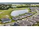 Aerial view showcasing home's location and lake proximity at 2717 Greenlands St, St Cloud, FL 34772