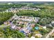 Aerial view of a community featuring houses and surrounding nature at 188 Ridgemont Ct, Davenport, FL 33896
