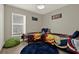 bedroom with two twin beds and Marvel decor at 188 Ridgemont Ct, Davenport, FL 33896