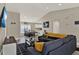 Living area with gray sectional sofa and wood coffee table at 188 Ridgemont Ct, Davenport, FL 33896