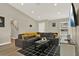 Spacious living room featuring a comfortable sectional sofa and coffee table at 188 Ridgemont Ct, Davenport, FL 33896