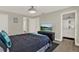 Bedroom with a large TV and en-suite bathroom at 188 Ridgemont Ct, Davenport, FL 33896