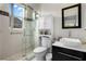 Clean bathroom with a walk-in shower, toilet, and modern vanity at 957 Whispering Cypress Ln, Orlando, FL 32824