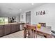 Kitchen dining area with wood table and chairs at 1154 Sea Pines Ct, Tavares, FL 32778