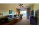 Comfortable living room with sofa and balcony access at 8101 Resort Village Dr, Orlando, FL 32821